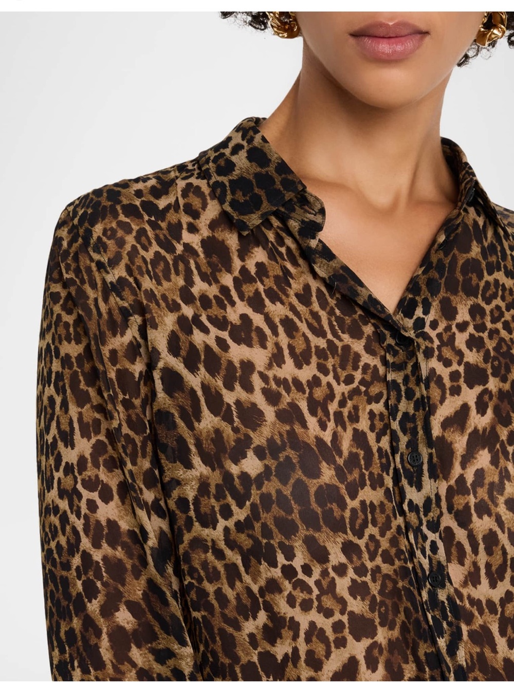 H&M sheer leopard print blouse with 3/4 sleeves.